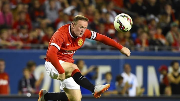 Jul 29, 2015; Chicago, IL, USA; Manchester United forward Wayne Rooney (10) kicks the ball against the Paris Saint-Germain during the second half at Soldier Field. Paris Saint-Germain defeats Manchester United 2-0. Mandatory Credit: Mike DiNovo-USA TODAY Sports