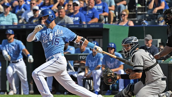 May 26, 2019; Kansas City, MO, USA; Kansas City Royals right fielder Whit Merrifield (15) hits the ball for the game winning run during the tenth inning against the New York Yankees at Kauffman Stadium. Mandatory Credit: Peter G. Aiken/USA TODAY Sports