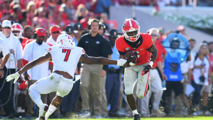 ATHENS, GA - SEPTEMBER 1: James Cook #6 of the Georgia Bulldogs carries the ball against James Bond #7 of the Austin Peay Governors on September 1, 2018 in Athens, Georgia. (Photo by Scott Cunningham/Getty Images)