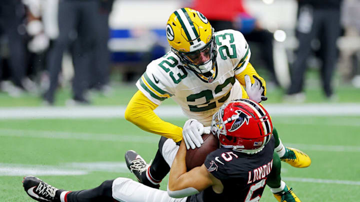 ATLANTA, GEORGIA - SEPTEMBER 17: Drake London #5 of the Atlanta Falcons is tackled by Jaire Alexander #23 of the Green Bay Packers during the second quarter at Mercedes-Benz Stadium on September 17, 2023 in Atlanta, Georgia. (Photo by Kevin C. Cox/Getty Images)