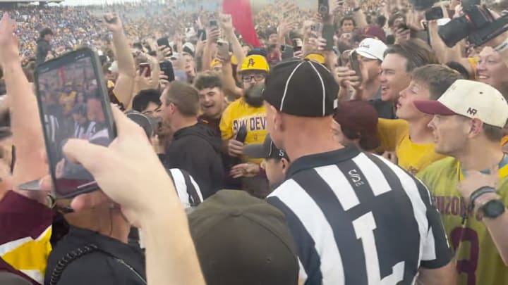 Arizona State fans storm the field before BYU game is over