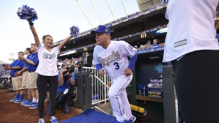 KANSAS CITY, MO - APRIL 3: Ned Yost #3 manager of the Kansas City Royals runs onto the field as he is introduced prior to a game against the New York Mets on opening day at Kauffman Stadium on April 3, 2016 in Kansas City, Missouri. (Photo by Ed Zurga/Getty Images)
