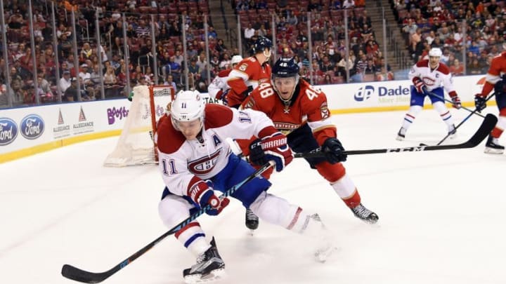 Dec 29, 2016; Sunrise, FL, USA; Montreal Canadiens right wing Brendan Gallagher (11) and Florida Panthers center Michael Sgarbossa (48) chase the puck during the first period at BB&T Center. Mandatory Credit: Steve Mitchell-USA TODAY Sports