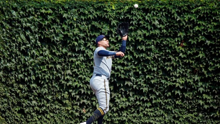Aug 10, 2021; Chicago, Illinois, USA; Milwaukee Brewers right fielder Avisail Garcia (24) makes a catch for an out on a ball hit by Chicago Cubs right fielder Greg Deichmann (not pictured) during the sixth inning at Wrigley Field. Mandatory Credit: Jon Durr-USA TODAY Sports