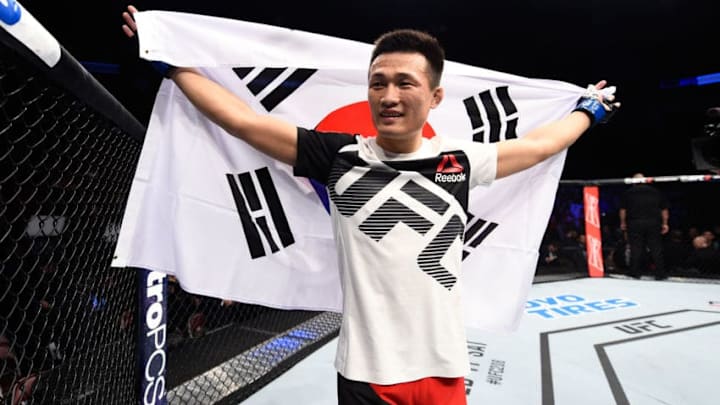 HOUSTON, TX - FEBRUARY 04: Chan Sung Jung of South Korea celebrates his victory over Dennis Bermudez in their featherweight bout during the UFC Fight Night event at the Toyota Center on February 4, 2017 in Houston, Texas. (Photo by Jeff Bottari/Zuffa LLC/Zuffa LLC via Getty Images)
