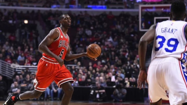 Apr 13, 2016; Chicago, IL, USA; Chicago Bulls forward Bobby Portis (5) dribbles the ball against Philadelphia 76ers forward Jerami Grant (39) during the fist quarter at the United Center. Mandatory Credit: Mike DiNovo-USA TODAY Sports