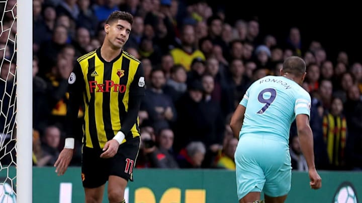 WATFORD, ENGLAND - DECEMBER 29: Salomon Rondon of Newcastle United celebrates after scoring his team's first goal as Adam Masina of Watford reacts during the Premier League match between Watford FC and Newcastle United at Vicarage Road on December 29, 2018 in Watford, United Kingdom. (Photo by Richard Heathcote/Getty Images)