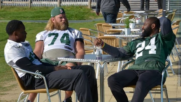 Oct 2, 2015; Sunbury-on-Thames, United Kingdom; New York Jets receiver Brandon Marshall (15), center Nick Mangold (74) and cornerback Darrelle Revis (24) at practice at the Hazelwood in advance of the NFL International Series game against the Miami Dolphins. Mandatory Credit: Kirby Lee-USA TODAY Sports