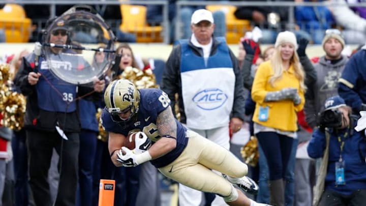 PITTSBURGH, PA - NOVEMBER 1: J.P. Holtz #86 of the Pittsburgh Panthers dives into the end zone for an 11-yard touchdown in the second quarter of the game against the Duke Blue Devils at Heinz Field on November 1, 2014 in Pittsburgh, Pennsylvania. (Photo by Joe Robbins/Getty Images)