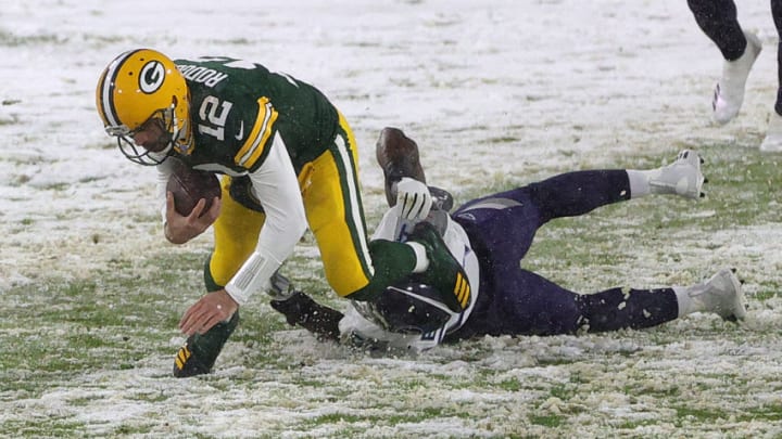Aaron Rodgers, Green Bay Packers, Rashaan Evans, Tennessee Titans. (Photo by Stacy Revere/Getty Images)