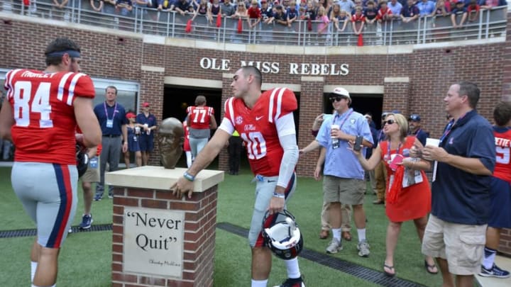 Sep 24, 2016; Oxford, MS, USA; Mississippi Rebels quarterback Chad Kelly (10) touches the Chucky Mullins statue as he runs into the locker room after the game against the Georgia Bulldogs at Vaught-Hemingway Stadium. Mississippi won 45-14. Mandatory Credit: Matt Bush-USA TODAY Sports