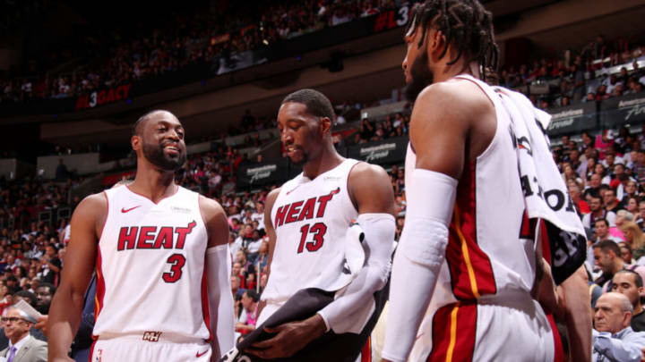 MIAMI, FL - APRIL 9: Dwyane Wade #3 of the Miami Heat, Bam Adebayo #13 of the Miami Heat, and Justise Winslow #20 of the Miami Heat seen during the game against the Philadelphia 76ers on April 9, 2019 at American Airlines Arena in Miami, Florida. NOTE TO USER: User expressly acknowledges and agrees that, by downloading and or using this Photograph, user is consenting to the terms and conditions of the Getty Images License Agreement. Mandatory Copyright Notice: Copyright 2019 NBAE (Photo by Issac Baldizon/NBAE via Getty Images)