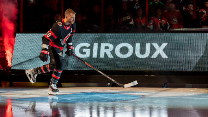 Oct 18, 2022; Ottawa, Ontario, CAN; Ottawa Senators right wing Claude Giroux (28) skates up the ice as he is introduced prior to the start of game against the Boston Bruins at the Canadian Tire Centre. Mandatory Credit: Marc DesRosiers-USA TODAY Sports