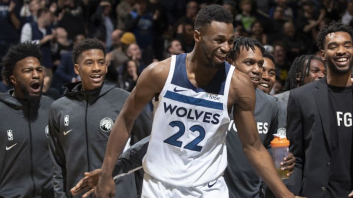 MINNEAPOLIS, MN - OCTOBER 27: Minnesota Timberwolves Andrew Wiggins (22) was greeted by teammates on the court after making his third three pointer late in the fourth quarter during an NBA basketball game at Target Center in Minneapolis, Minn. (Photo by Carlos Gonzalez/Star Tribune via Getty Images)