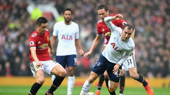MANCHESTER, UNITED KINGDOM - OCTOBER 28: Ander Herrera of Manchester United and Nemanja Matic of Manchester United tackles Christian Eriksen of Tottenham Hotspur during the Premier League match between Manchester United and Tottenham Hotspur at Old Trafford on October 28, 2017 in Manchester, England. (Photo by Michael Regan/Getty Images)