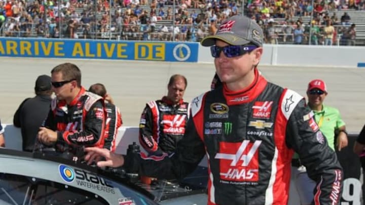 Sep 28, 2014; Dover, DE, USA; NASCAR Sprint Cup driver Kurt Busch stands by his car prior to the AAA 400 at Dover International Speedway. Mandatory Credit: Matthew O