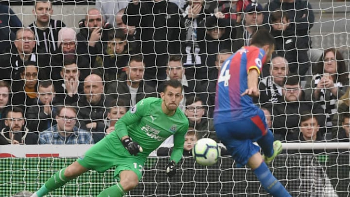 NEWCASTLE UPON TYNE, ENGLAND - APRIL 06: Luka Milivojevic of Crystal Palace celebrates after scoring his team's first goal from the penalty spot past Martin Dubravka of Newcastle United during the Premier League match between Newcastle United and Crystal Palace at St. James Park on April 06, 2019 in Newcastle upon Tyne, United Kingdom. (Photo by Stu Forster/Getty Images)