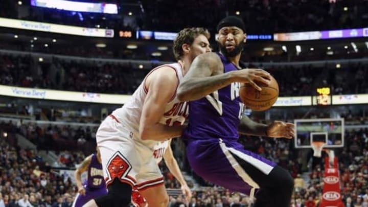 Mar 21, 2016; Chicago, IL, USA; Sacramento Kings center DeMarcus Cousins (15) is defended by Chicago Bulls center Pau Gasol (16) during the second half at United Center. Bulls won 109-102. Mandatory Credit: Kamil Krzaczynski-USA TODAY Sports