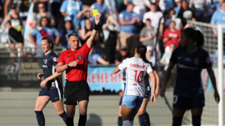 CARY, NC – OCTOBER 27: Referee Rosendo Mendoza cards Vanessa DiBernardo #10 of the Chicago Red Stars during a game between Chicago Red Stars and North Carolina Courage at Sahlen’s Stadium at WakeMed Soccer Park on October 27, 2019 in Cary, North Carolina. The North Carolina Courage defeated the Chicago Red Stars 4-0 to win the 2019 NWSL Championship. (Photo by Andy Mead/ISI Photos/Getty Images).