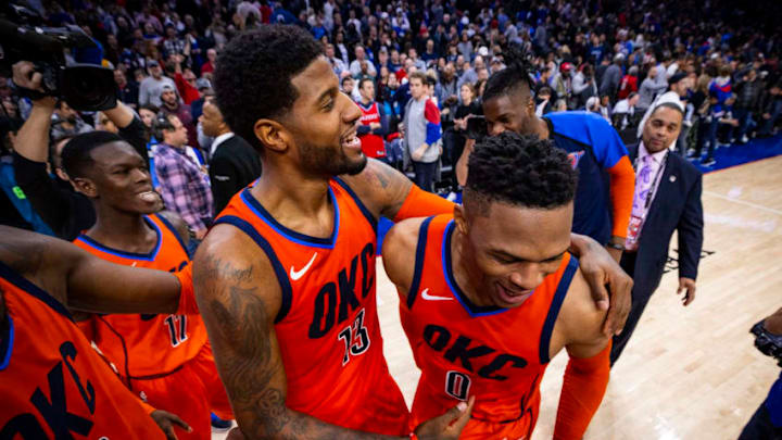 PHILADELPHIA, PA - JANUARY 19: Paul George #13 and Russell Westbrook #0 of the Oklahoma City Thunder celebrate after the game against the Philadelphia 76ers on January 19, 2019 at the Wells Fargo Center in Philadelphia, Pennsylvania. NOTE TO USER: User expressly acknowledges and agrees that, by downloading and/or using this photograph, user is consenting to the terms and conditions of the Getty Images License Agreement. Mandatory Copyright Notice: Copyright 2019 NBAE (Photo by Zach Beeker/NBAE via Getty Images)
