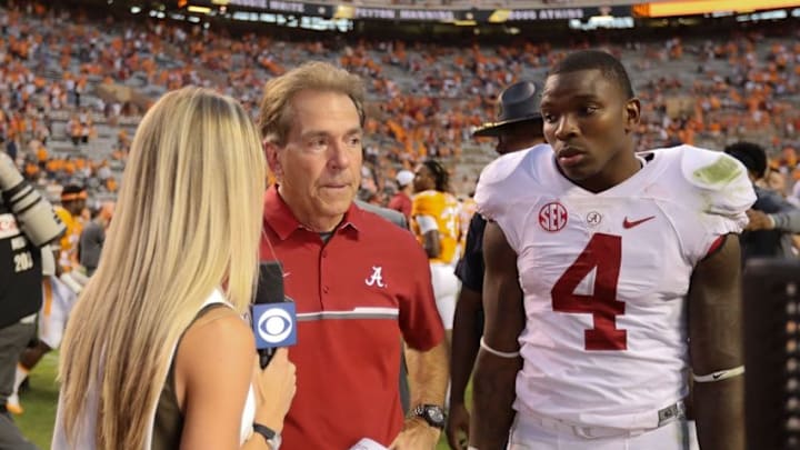Oct 15, 2016; Knoxville, TN, USA; Alabama Crimson Tide head coach Nick Saban (C) and Alabama Crimson Tide defensive back Eddie Jackson (4) speak to the media after their game against the Tennessee Volunteers at Neyland Stadium. Alabama won 49 to 10. Mandatory Credit: Randy Sartin-USA TODAY Sports