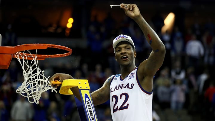 OMAHA, NE – MARCH 25: Silvio De Sousa #22 of the Kansas Jayhawks celebrates cutting down the net after defeating the Duke Blue Devils with a score of 81 to 85 in the 2018 NCAA Men’s Basketball Tournament Midwest Regional at CenturyLink Center on March 25, 2018 in Omaha, Nebraska. (Photo by Jamie Squire/Getty Images)