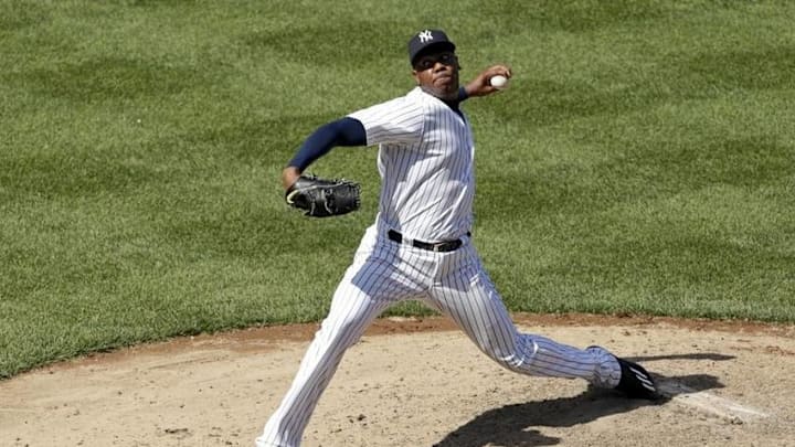 Jun 30, 2016; Bronx, NY, USA; New York Yankees relief pitcher Aroldis Chapman (54) pitches against the Texas Rangers during the ninth inning at Yankee Stadium. Yankees won 2-1. Mandatory Credit: Adam Hunger-USA TODAY Sports