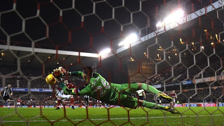 NOTTINGHAM, ENGLAND - DECEMBER 02: Karl Darlow of Newcastle Unitedd saves a penalty from Nicklas Bendtner of Nottingham Forest during the Sky Bet Championship match between Nottingham Forest and Newcastle United at City Ground on December 2, 2016 in Nottingham, England. (Photo by Laurence Griffiths/Getty Images)