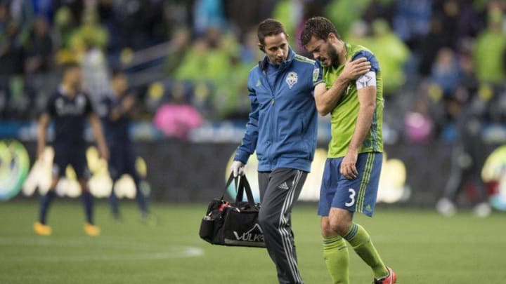 Mar 6, 2016; Seattle, WA, USA; Seattle Sounders defender Brad Evans walks off the field after getting injured during the second half in a game against Sporting KC at CenturyLink Field. Sporting KC won 1-0. Mandatory Credit: Troy Wayrynen-USA TODAY Sports