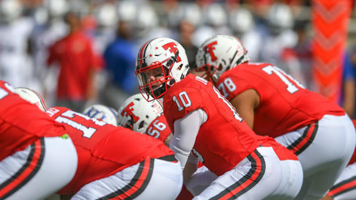 LUBBOCK, TX - OCTOBER 20: Alan Bowman #10 of the Texas Tech Red Raiders calls signals at the line of scrimmage during the first half of the game against the Kansas Jayhawks on October 20, 2018 at Jones AT&T Stadium in Lubbock, Texas. (Photo by John Weast/Getty Images)