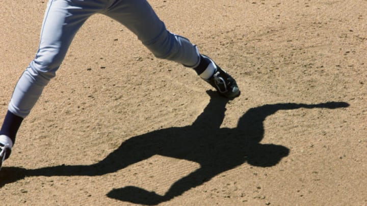 DENVER - JUNE 14: A detail of a shadow from Jamie Moyer