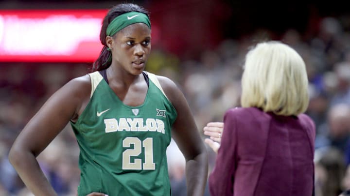 STORRS, CONNECTICUT- NOVEMBER 17: Baylor Head coach Kim Mulkey on the sideline talking with Kalani Brown