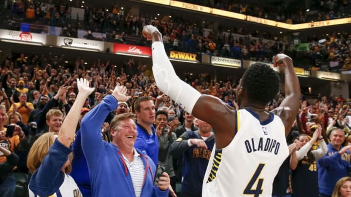 INDIANAPOLIS, IN - DECEMBER 10: Victor Oladipo #4 of the Indiana Pacers celebrates with fans after defeating the Denver Nuggets at Bankers Life Fieldhouse on December 10, 2017 in Indianapolis, Indiana. NOTE TO USER: User expressly acknowledges and agrees that, by downloading and or using this photograph, User is consenting to the terms and conditions of the Getty Images License Agreement. (Photo by Michael Hickey/Getty Images)