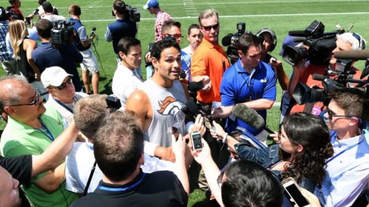Jul 28, 2016; Englewood, CO, USA; Denver Broncos quarterback Mark Sanchez (6) speaks to the media following training camp drills held at the UCHealth Training Center. Mandatory Credit: Ron Chenoy-USA TODAY Sports