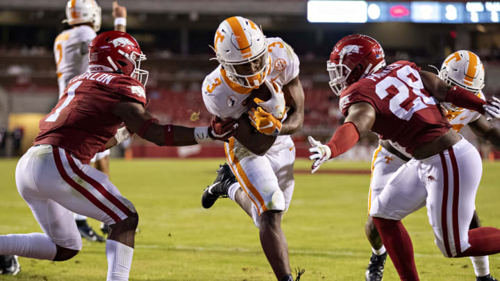 FAYETTEVILLE, AR – NOVEMBER 7: Eric Gray #3 of the Tennessee Volunteers runs the ball in for a touchdown in the first half of a game against the Arkansas Razorbacks at Razorback Stadium on November 7, 2020 in Fayetteville, Arkansas. (Photo by Wesley Hitt/Getty Images)