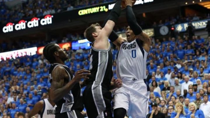 Apr 28, 2014; Dallas, TX, USA; Dallas Mavericks forward Shawn Marion (0) has his shot blocked by San Antonio Spurs center Tiago Splitter (22) in the second half in game four of the first round of the 2014 NBA Playoffs at American Airlines Center. The Spurs beat the Mavs 93-89. Mandatory Credit: Matthew Emmons-USA TODAY Sports