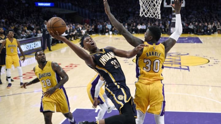 LOS ANGELES, CA - JANUARY 20: Myles Turner #33 of the Indiana Pacers goes up for a layup as he defended by Julius Randle #30 of the Los Angeles Lakers during the second half of the basketball game at Staples Center January 20 2017, in Los Angeles, California. NOTE TO USER: User expressly acknowledges and agrees that, by downloading and or using this photograph, User is consenting to the terms and conditions of the Getty Images License Agreement. (Photo by Kevork Djansezian/Getty Images)