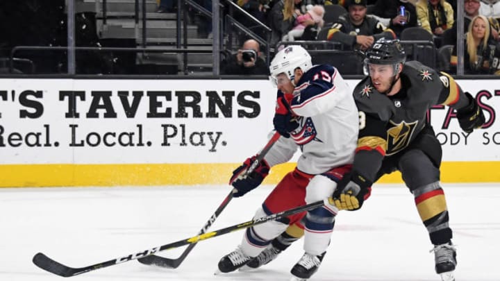 LAS VEGAS, NEVADA - FEBRUARY 09: Cam Atkinson #13 of the Columbus Blue Jackets skates with the puck against Brayden McNabb #3 of the Vegas Golden Knights in the third period of their game at T-Mobile Arena on February 9, 2019 in Las Vegas, Nevada. The Blue Jackets defeated the Golden Knights 4-3. (Photo by Ethan Miller/Getty Images)