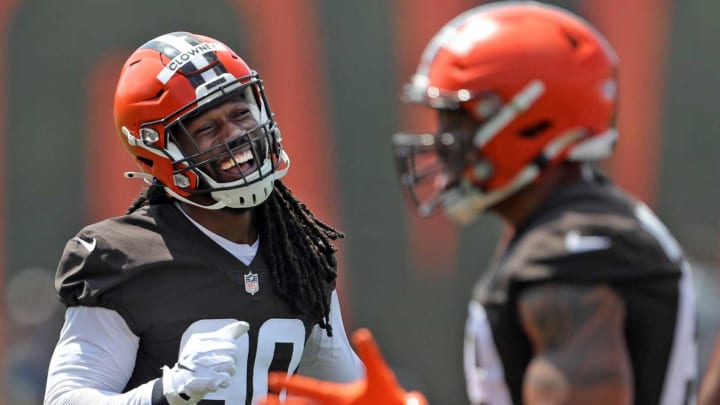 Cleveland Browns defensive end Jadeveon Clowney, left, laughs with teammates during NFL football training camp, Friday, July 30, 2021, in Berea, Ohio.Brownscamp31 11