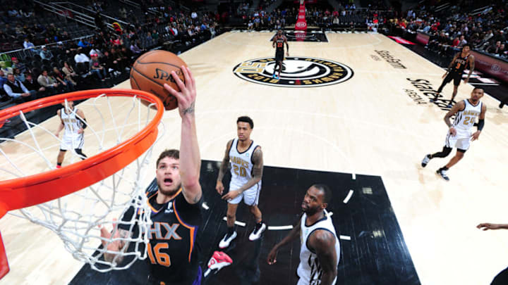 ATLANTA, GA - FEBRUARY 23: Tyler Johnson #16 of the Phoenix Suns shoots the ball against the Atlanta Hawks on February 23, 2019 at State Farm Arena in Atlanta, Georgia. NOTE TO USER: User expressly acknowledges and agrees that, by downloading and/or using this Photograph, user is consenting to the terms and conditions of the Getty Images License Agreement. Mandatory Copyright Notice: Copyright 2019 NBAE (Photo by Scott Cunningham/NBAE via Getty Images)