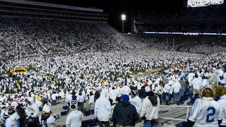 Oct 22, 2016; University Park, PA, USA; Penn State Nittany Lions fans celebrate their teams victory on the field against the Ohio State Buckeyes at Beaver Stadium. Penn State defeated Ohio State 24-21. Mandatory Credit: Rich Barnes-USA TODAY Sports