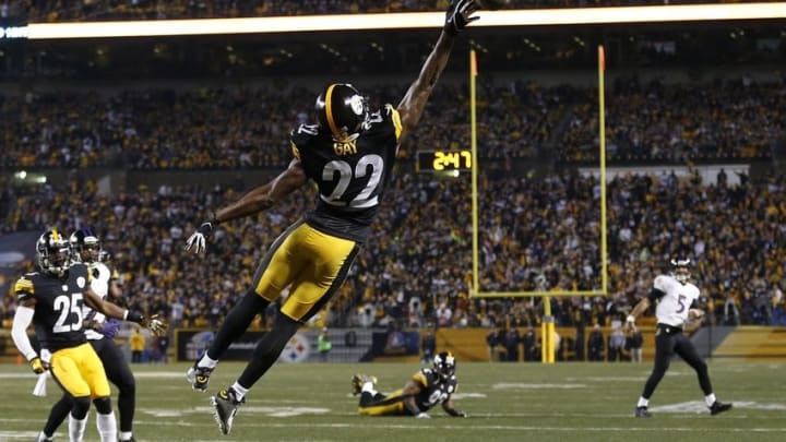 Jan 3, 2015; Pittsburgh, PA, USA; Pittsburgh Steelers cornerback William Gay (22) defends a pass by Baltimore Ravens quarterback Joe Flacco (5) in the second quarter in the 2014 AFC Wild Card playoff football game at Heinz Field. Mandatory Credit: Geoff Burke-USA TODAY Sports