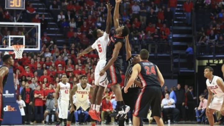 Jan 9, 2016; Oxford, MS, USA; Georgia Bulldogs forward Yante Maten (1) and Mississippi Rebels forward Marcanvis Hymon (5) battle for the opening tip off during the first half at The Pavilion at Ole Miss. Mandatory Credit: Spruce Derden-USA TODAY Sports