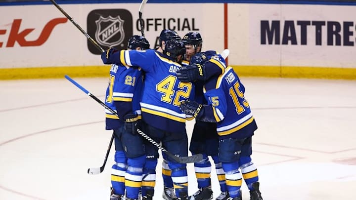 Apr 21, 2016; St. Louis, MO, USA; St. Louis Blues center David Backes (42) celebrates with teammates after scoring a goal against the Chicago Blackhawks during the third period in game five of the first round of the 2016 Stanley Cup Playoffs at Scottrade Center. Mandatory Credit: Billy Hurst-USA TODAY Sports
