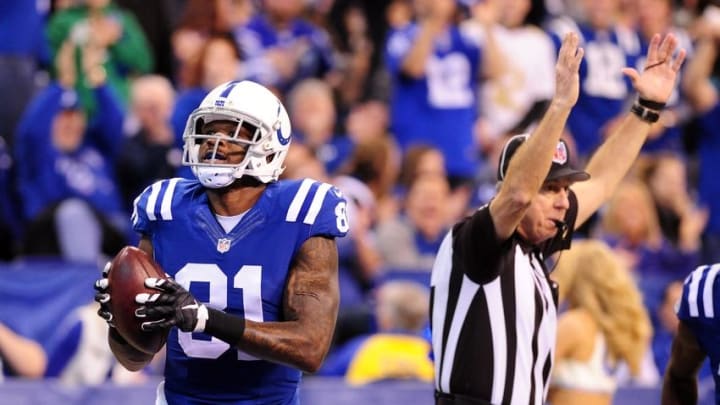 Jan 3, 2016; Indianapolis, IN, USA; Indianapolis Colts receiver Andre Johnson (81) reacts after making a touchdown catch against Tennessee Titans cornerback B.W. Webb (not pictured) at Lucas Oil Stadium. Mandatory Credit: Thomas J. Russo-USA TODAY Sports