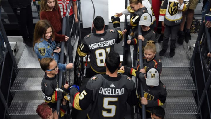 LAS VEGAS, NEVADA - SEPTEMBER 29: Jonathan Marchessault #81 and Deryk Engelland #5 of the Vegas Golden Knights take the ice for warm-ups prior to a game against the San Jose Sharks at T-Mobile Arena on September 29, 2019 in Las Vegas, Nevada. (Photo by David Becker/NHLI via Getty Images)