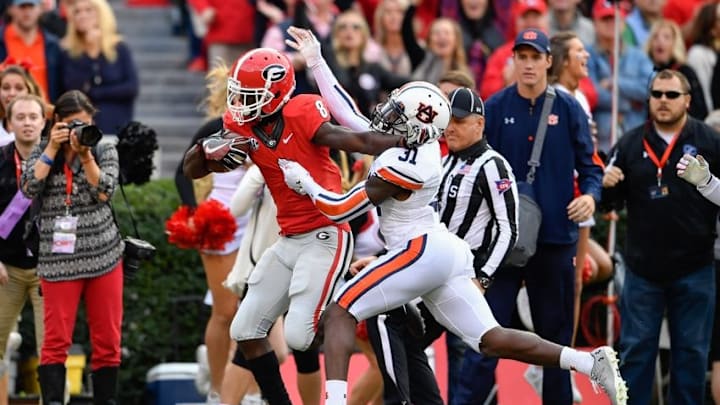 Nov 12, 2016; Athens, GA, USA; Georgia Bulldogs wide receiver Riley Ridley (8) runs after a catch against Auburn Tigers defensive back Javaris Davis (31) during the first quarter at Sanford Stadium. Mandatory Credit: Dale Zanine-USA TODAY Sports