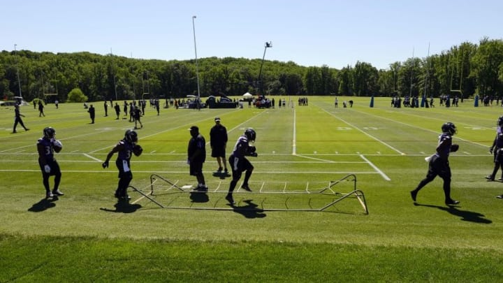 Jun 14, 2016; Baltimore, MD, USA; Baltimore Ravens running backs go through drills during the first day of minicamp sessions at Under Armour Performance Center. Mandatory Credit: Tommy Gilligan-USA TODAY Sports