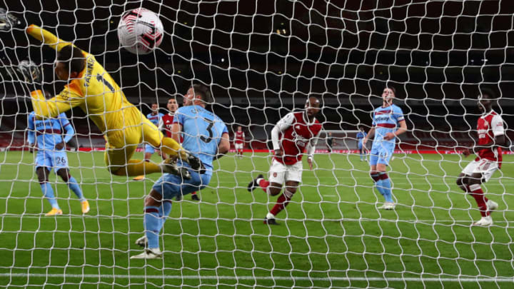 LONDON, ENGLAND – SEPTEMBER 19: Alexandre Lacazette of Arsenal scores his team’s first goal past Lukasz Fabianski of West Ham United during the Premier League match between Arsenal and West Ham United at Emirates Stadium on September 19, 2020 in London, England. (Photo by Julian Finney/Getty Images)