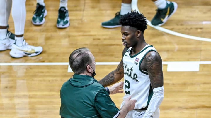 Michigan State’s head coach Tom Izzo, left, talks with Rocket Watts during the second half in the game against Rutgers on Tuesday, Jan. 5, 2021, at the Breslin Center in East Lansing.210105 Msu Rutgers 142a